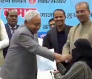 Indian CM pulls down Muslim woman's hijab at official event