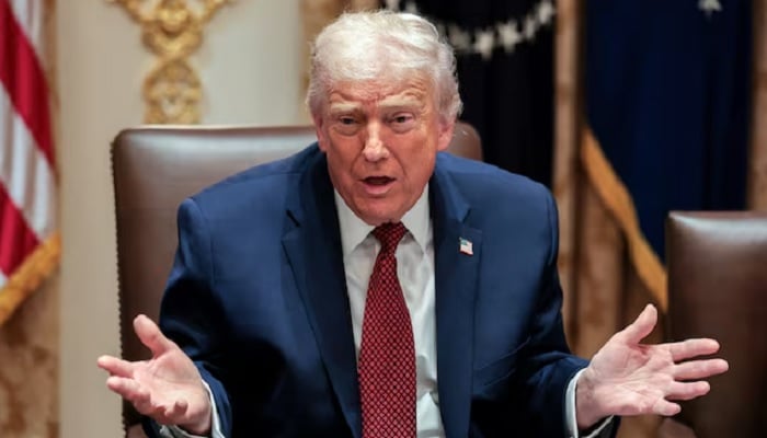 US President Donald Trump gestures as he attends a roundtable discussion on the day he announced an aid package for farmers, at the White House in Washington, DC, US, December 8, 2025.— Reuters