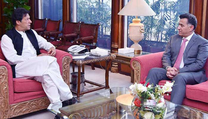 Ex-PM Imran Khan pictured alongside then ISI chief Faiz Hamid. — PID/File