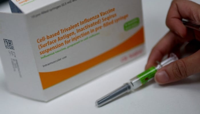 A representative image shows a box of influenza vaccine displayed at a pharmacy in London, Britain, on December 11, 2025. — Reuters