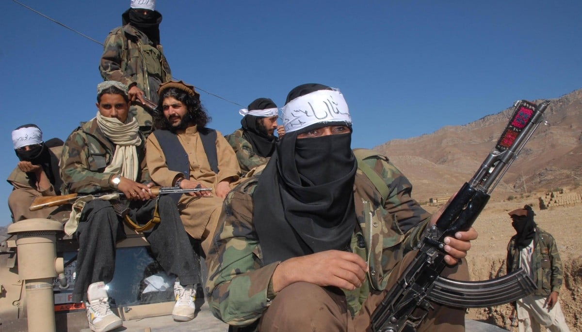 Tehreek-e-Taliban Pakistan militants are seen in this photograph carrying weapons. — AFP/File