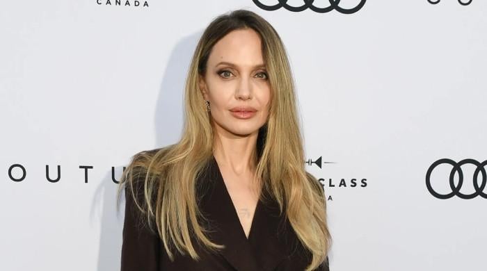 Angelina Jolie reveals why she's showing her mastectomy scars now