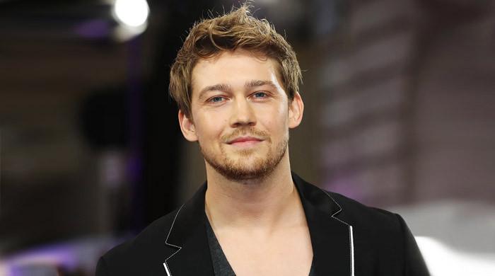 Joe Alwyn rocks denim coded look during ‘Hamnet' promotions