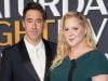 Amy Schumer, Chris Fischer still living together post split