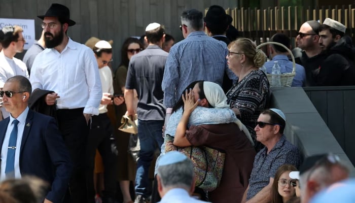 Mourners attend the funeral of Rabbi Eli Schlanger, who was killed during a shooting at a Jewish Hanukkah celebration at Sydneys Bondi Beach on Sunday, at Chabad of Bondi synagogue, in Sydney, Australia, December 17, 2025. — Reuters