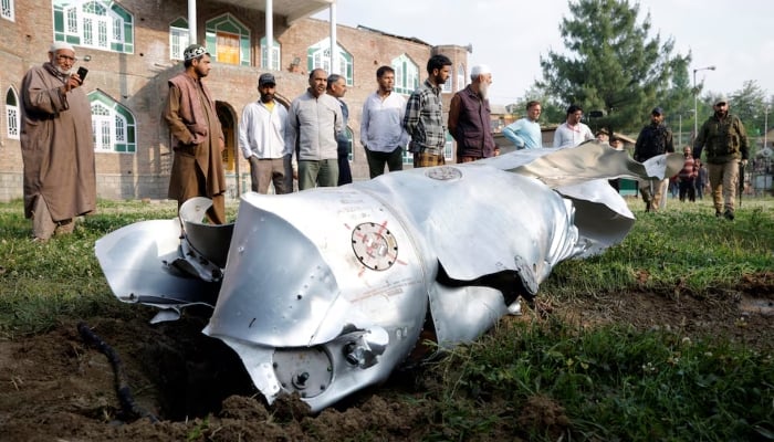 Metal debris lies on the ground in Wuyan in Indian Illegally Occupied Jammu and Kashmirs Pulwama district, May 7, 2025. — Reuters