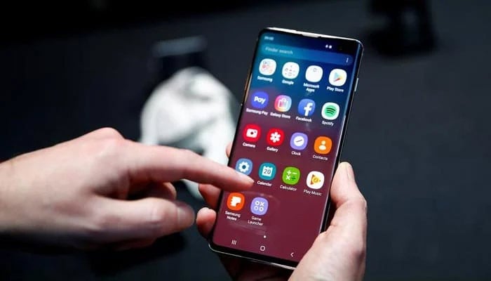 A journalist uses the new Samsung Galaxy S10 smartphone at a press event in London, Britain, February 20, 2019. — Reuters/File