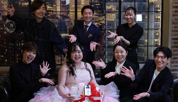 Yurina Noguchi holds a basket with her smartphone displaying AI-generated image of her AI partner Klaus in Japan. — Reuters