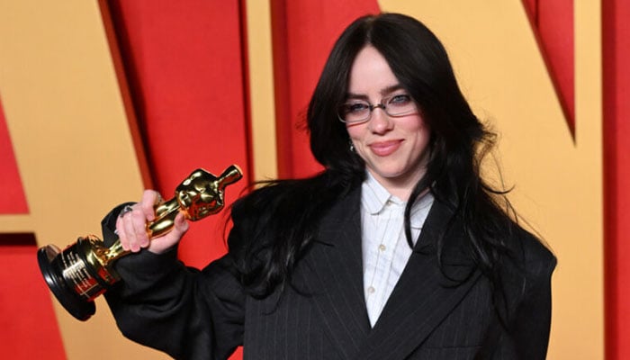 Billie Eilish marks departure from her usual look