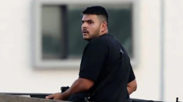  Australia police charge alleged Bondi Beach gunman with 59 offences, including terror