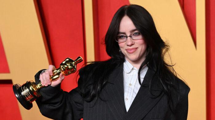 Billie Eilish marks departure from her usual look