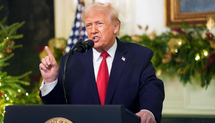 US President Donald Trump addresses the nation from the Diplomatic Reception Room of the White House in Washington, DC, on December 17, 2025. — AFP