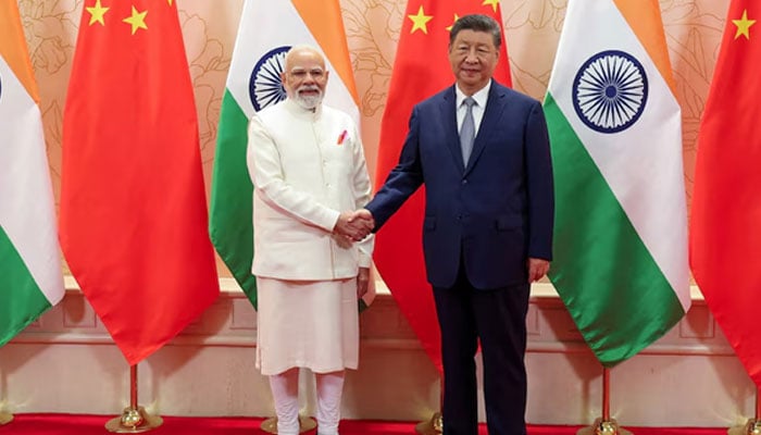 Indias Prime Minister Narendra Modi *left) shakes hands with Chinese President Xi Jinping during a meeting on the sidelines of Shanghai Cooperation Organisation (SCO) Summit in Tianjin, China, August 31, 2025. — Reuters