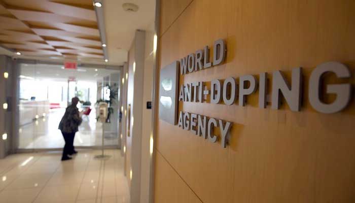 A woman walks into the head office of the World Anti-Doping Agency (WADA) in Montreal, Quebec, Canada. — Reuters/File