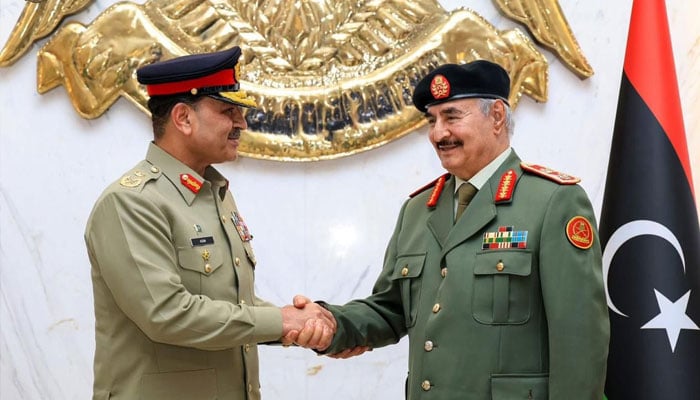 COAS and CDF Field Marshal Syed Asim Munir (left) shakes hand with Commander-in-Chief of Libyan Arab Armed Forces Field Marshal Khalifa Belqasim Haftar on December 18, 2025. — ISPR