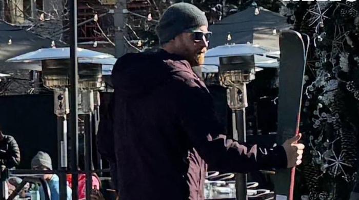 Prince Harry saddles up again with his trademark beard