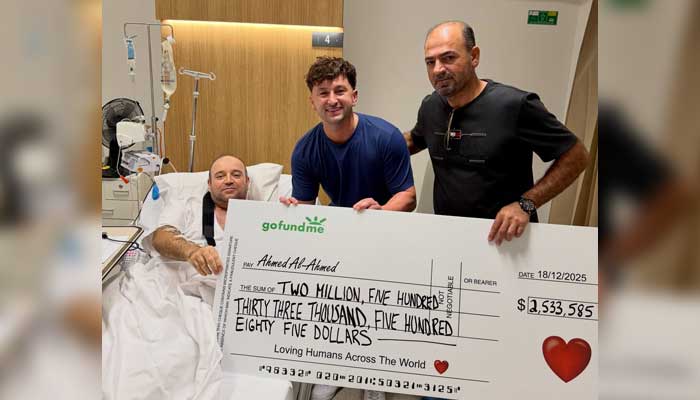 Bondi Beach shooting hero Ahmed al Ahmed receives GoFundMe cheque from social media influencer  Zachery Dereniowski on December 18, 2025. — Instagram@mdmotivator
