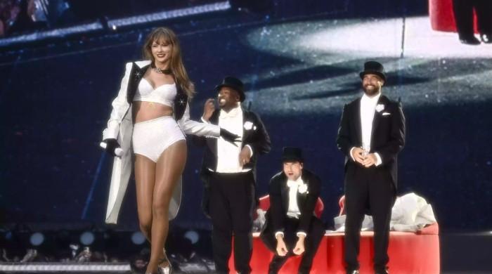 Taylor Swift shares how Travis Kelce's Eras Tour cameo happened