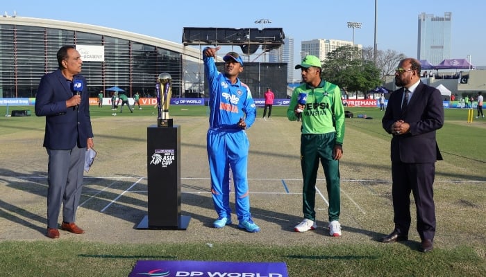 Pakistan captain Farhan Yousaf and India captain Ayush Mhatre at the toss dudrin the ACC U19 Asia Cup Final in Dubai, December 21, 2025. — X/@TheRealPCB