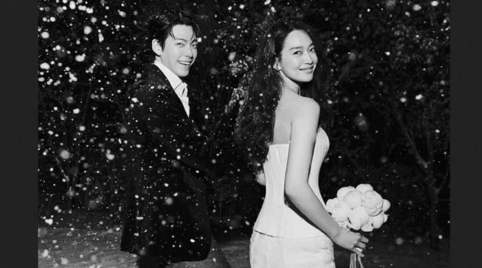 Kim Woo-bin, Shin Min-ah tie knot in snowy wedding as first photo revealed