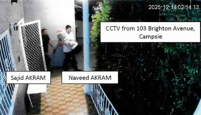This handout photo from a court exhibit released by the NSW Courts shows a screengrab taken from CCTV footage of Sajid and Naveed Akram exiting 103 Brighton Avenue in Campsie on December 14, 2025. — AFP