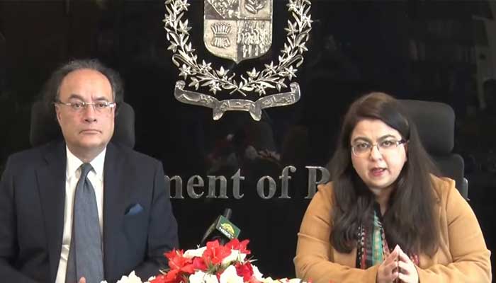Finance Minister Muhammad Aurangzeb and Minister of State for Information Technology and Telecommunication (IT) Shaza Fatima Khawaja speak during a press conference on December 23, 2025. — Screengrab via Geo News