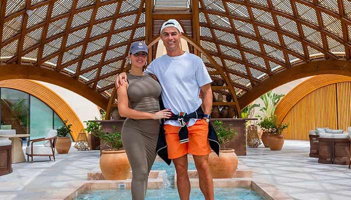 Cristiano Ronaldo poses with his fiancée Georgia Rodrigues at Ritz-Carlton Reserves Residence in Saudi Arabia. — Daily Mail