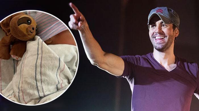 Enrique Iglesias reveals first glimpse of newborn baby 