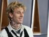 MGK flaunts tattooed body during Lost Americana Tour break