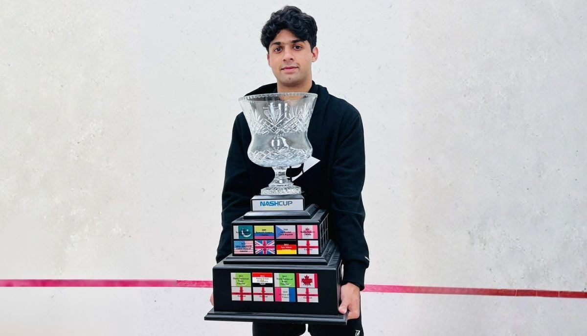 Noor Zaman with trophy after winning Nash Cup final. — Instagram/@noorzmn