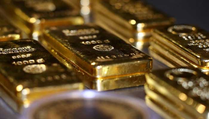 Gold bars and coins are stacked in the safe deposit boxes room of the Pro Aurum gold house in Munich, Germany. — Reuters/File