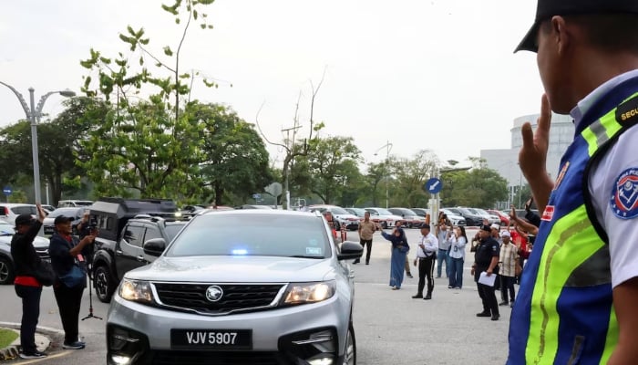A convoy carrying former Malaysian Prime Minister Najib Razak arrives at the Palace of Justice in Putrajaya, Malaysia, December 26, 2025. — Reuters