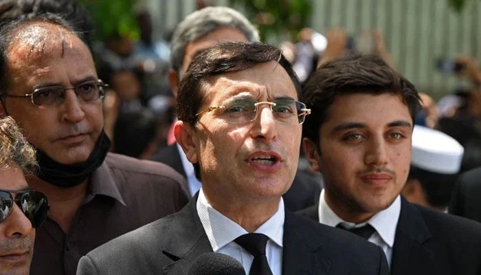 PTI Chairman Barrister Gohar Ali Khan (centre) talks to the media as he arrives to attend a hearing at the high court in Islamabad on August 29, 2023. — AFP