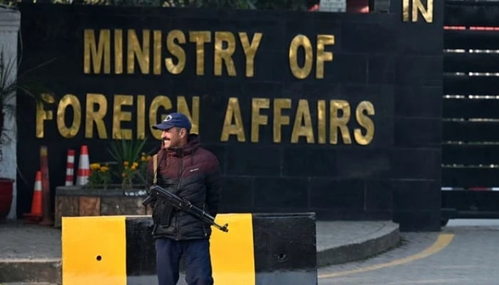 A Pakistani police officer stands guard outside the Ministry of Foreign Affairs in Islamabad on January 18, 2024. — AFP