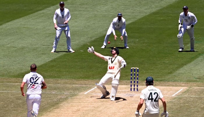 Australian batsman Steve Smith (C) reacts as he plays a shot on the second day of the fourth Ashes cricket Test match between Australia and England at the Melbourne Cricket Ground (MCG) in Melbourne on December 27, 2025. — AFP