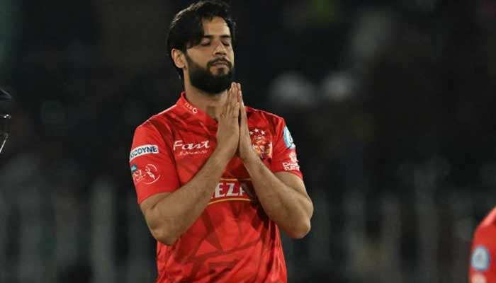 Pakistans former all-rounder poses after taking a wicket in an undated picture while representing Islamabad United in the Pakistan Super League (PSL). — Instagram/@imadwasim