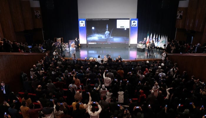A group of Iranian students watch the launch of a Russian satellite-carrier carrying Iranian satellites on a screen in Tehran, Iran December 28, 2025. — Reuters