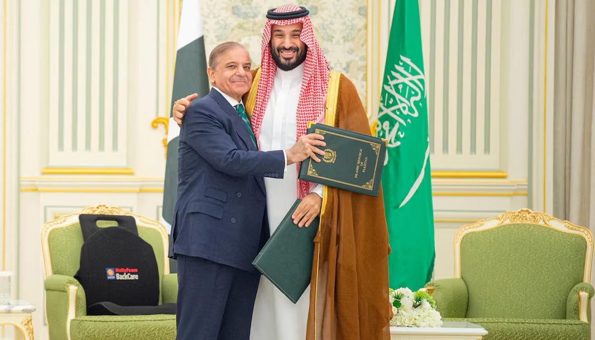 Saudi Crown Prince Mohammed bin Salman and Prime Minister Shehbaz Sharif embrace each other on the day they sign a defence agreement, in Riyadh, Saudi Arabia, September 17, 2025. — Reuters