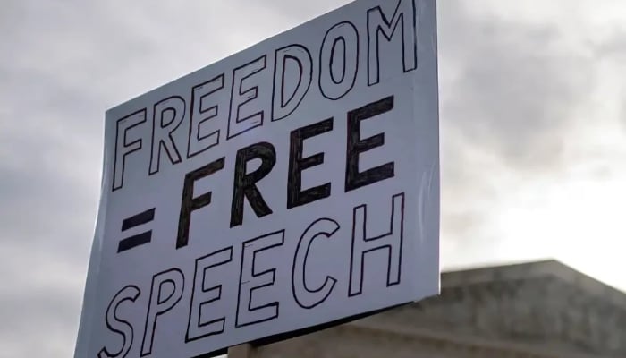 Demonstrators hold a placard during a protest outside US Supreme Court in Washington on March 18, 2024. — Reuters