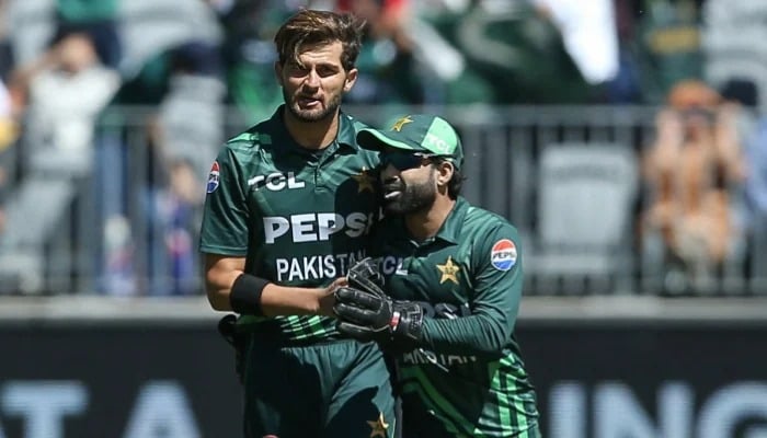 Pakistan’s Shaheen Afridi celebrates with captain Mohammad Rizwan (right) after taking the final Australian wicket in the third ODI at Perth Stadium on November 10, 2024. — AFP