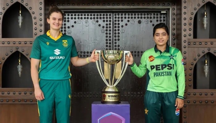Laura Wolvaardt and Fatima Sana pose with the ODI series trophy after the Pakistan vs South Africa series in Lahore on September 15, 2025. — Cricket South Africa