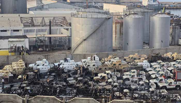 A photograph shows damaged military vehicles, reportedly sent by the UAE to support Southern Transitional Council (STC), following an airstrike carried out by the Saudi-led coalition in the port of Mukalla, southern Yemen, December 30, 2025. — AFP