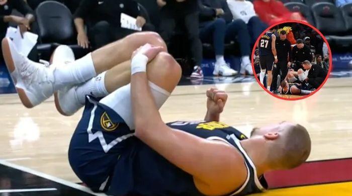 Nikola Jokic injures knee in Nuggets' loss to Heat, MRI scheduled