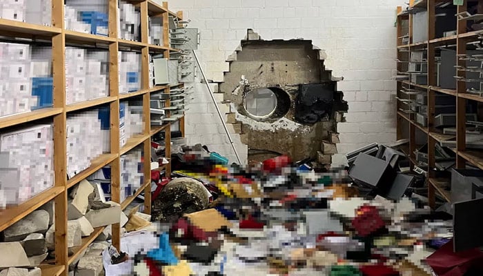 A hole gapes in a wall after thieves drilled into the vault of a Sparkasse savings bank in Gelsenkirchen, Germany, on December 29, 2025, in this image released December 30, 2025, by the police. — Reuters