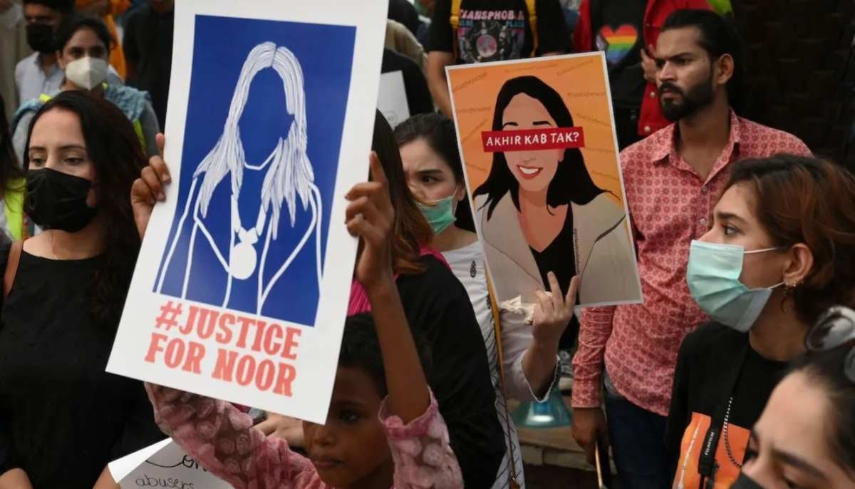 Women rights activists hold placards during a demonstration in Lahore on July 24, 2021, against the brutal killing of Noor Mukadam in Islamabad. — AFP/File