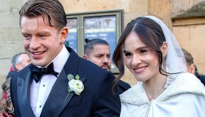 Adam tied the knot with influencer Holly at Bath Cathedral on December 27