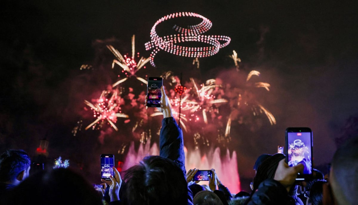 Fireworks explode during the celebrations in Barcelona, Spain. — Reuters