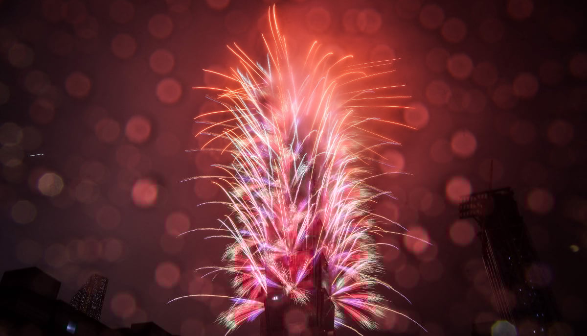 Fireworks from the Taipei 101 building light up the midnight sky in the heavy rain during 2026 New Year´s Day celebrations in Taipei on January 1, 2026. — AFP