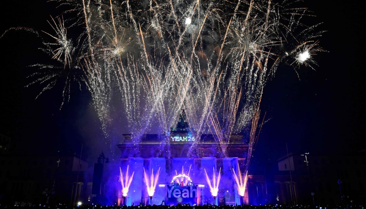 Fireworks explode over Berlins landmark, the Brandenburg Gate, during festivities titled Yeah 26 to celebrate the New Year, in Berlin on January 1, 2026. — AFP