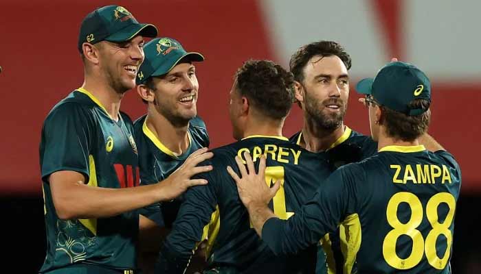 Glenn Maxwell of Australia celebrates with teammates after the run out of Lhuan-dre Pretorius of South Africa during game two in the T20 International series between Australia and South Africa at Marrara Stadium on August 12, 2025 in Darwin, Australia. - CA